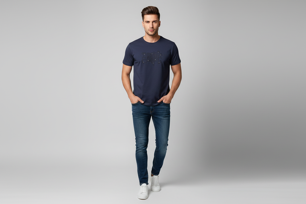 Model wearing navy blue embossed graffiti graphic t-shirt
