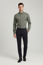 Model wearing olive green eagle logo shirt