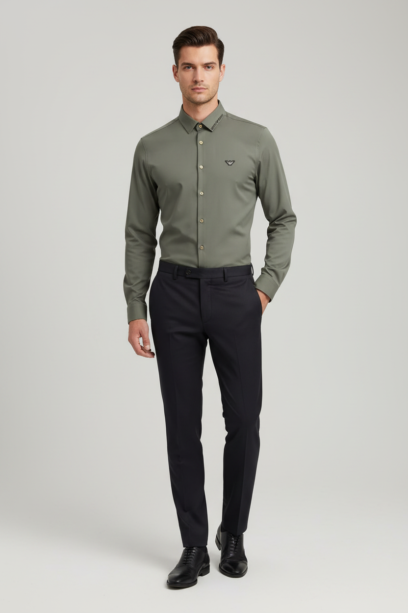 Model wearing olive green eagle logo shirt
