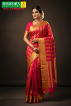 Model wearing Pink & Mustard Striped Kanjivaram Saree