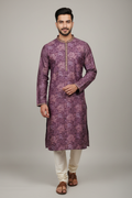 Model wearing purple floral kurta