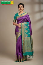 Model wearing Purple & Teal Kota Saree