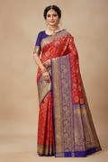 Model wearing red and royal blue Banarasi saree
