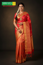 Model wearing Red & Peach Kanjivaram Saree
