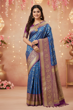 Model wearing royal blue Banarasi saree with deep purple border