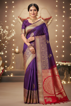 Model wearing royal purple Kanchipuram silk saree with red pallu and gold zari elephant motifs