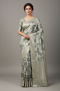 Model wearing sage green abstract watercolor tree print tissue saree