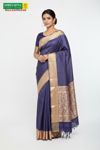 Model wearing Shreeshta blue-violet saree with blush pink pallu