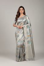 Model wearing silver grey geometric holographic tissue saree
