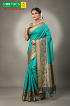 Model wearing Teal & Charcoal Kota Saree