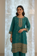 Model wearing teal green zardozi kurta