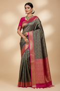 Model wearing Teal & Hot Pink Banarasi Saree