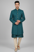 Model wearing teal sherwani