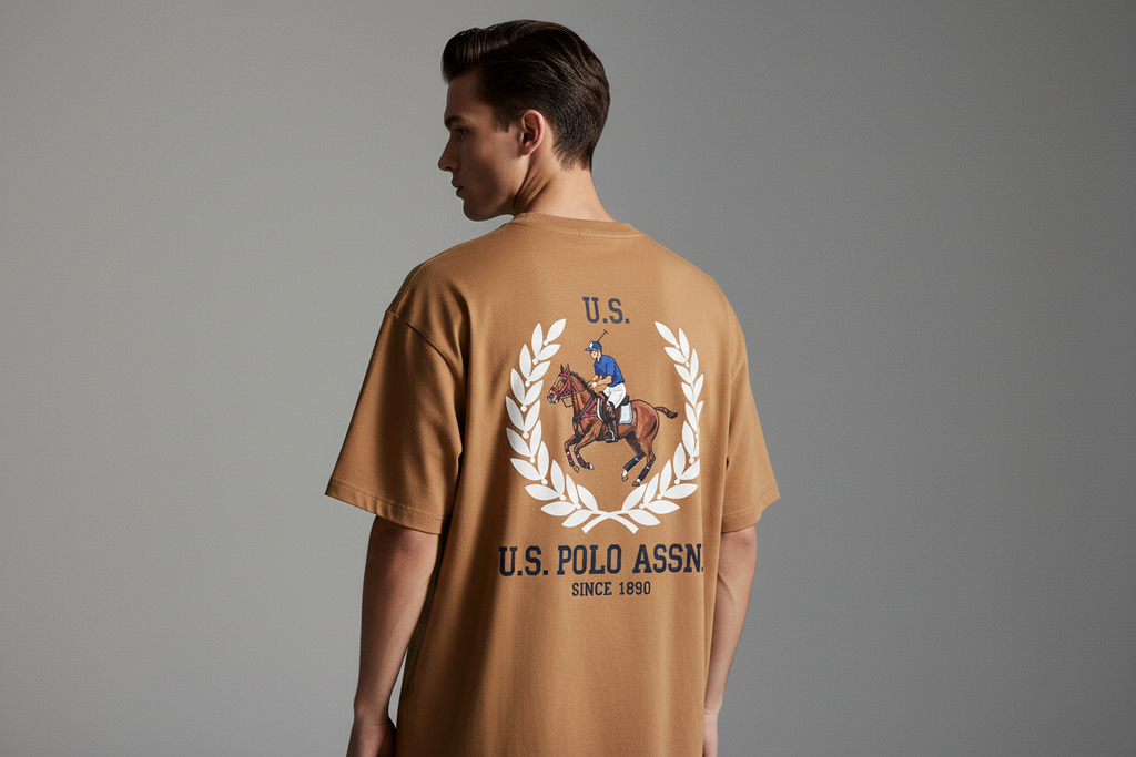 Model wearing U.S. Polo Assn. camel t-shirt - back