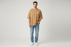 Model wearing U.S. Polo Assn. camel t-shirt - front