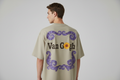 Model wearing Van Gogh beige t-shirt - back