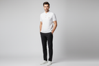 Model wearing white textured grid polo shirt