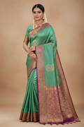 South Indian Model in Sea Green Silk Saree with Gold Paisley Buti & Magenta Zari Border