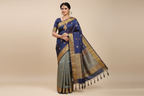 Woman wearing blue grey Kanchipuram silk saree